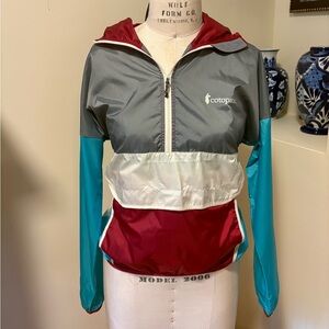 Cotopaxi Multicolored Windbreaker Jacket with hood and front pocket